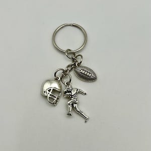 Aged Silver Football Charms Keychain; Player, Ball, and Helmet Included