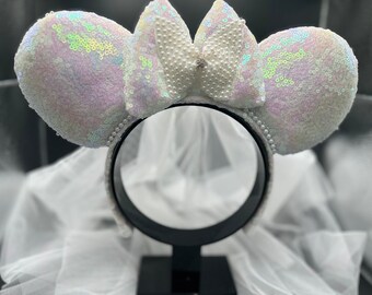 Bridal inspired mouse ears. Pearl accents and iridescent fabric ear headband.