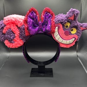 Cheshire Cat inspired mouse ears. Grinning cat from Alice in Wonderland ear headband