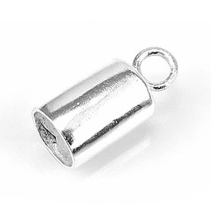 May include: Silver-toned metal end cap with a small loop for attaching to a necklace or bracelet.
