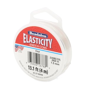 May include: Clear Beadalon Elasticity stretch cord in a clear plastic spool. The spool has a red and white label with the product name and details. The cord is .060 inches in diameter and 13.1 feet (4 m) long.