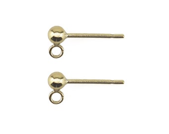 May include: Two gold-toned earring posts with a small ball at the top and a loop at the bottom.
