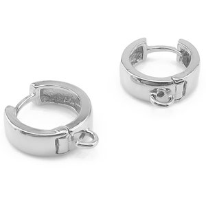 May include: A pair of silver hoop earrings with a hinged clasp and a small loop on the bottom.