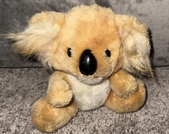 Caja de música vintage Dakin Koala Bear con melodía, 1983