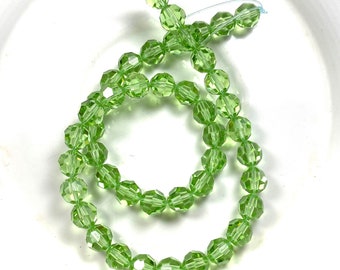 Swarovski Light Green 5301 8mm 44pcs