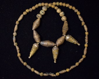 Gold washed bronze beads. Yoruba made. Nigeria. Early 1900s 22 ins