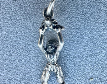 Charm. Native American Holding a Skull, Tiny, Sterling Silver Super Rare.