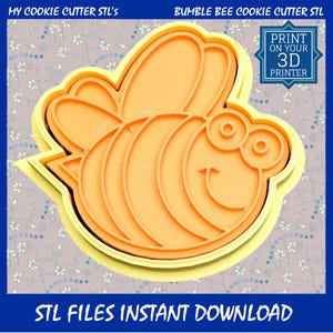 May include: A yellow and orange bumble bee cookie cutter. The cutter is in the shape of a smiling bee with large eyes and wings. Text on the image says "Print on your 3D printer" and "STL Files Instant Download."