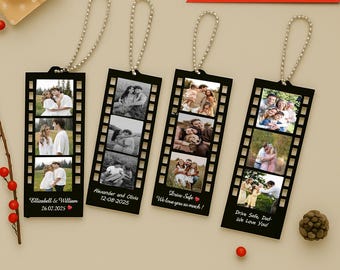 May include: Black filmstrip-shaped photo ornaments with custom photos and text. Each ornament has a silver chain for hanging. The ornaments feature family photos and text like "Ellizabell & William 26.02.2025".
