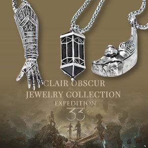 EXCLUSIVE Clair Obscur: Expedition 33 Jewelry, 950 Silver Pendant Collection, Gustave’s Arm, Lumina Converter & Alicia&#39;s Mask, Expedition 33