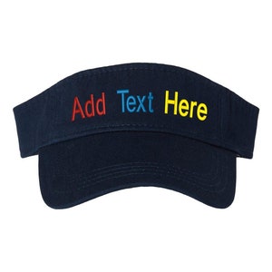 May include: A navy blue visor with the text "Add Text Here" embroidered in red, blue, and yellow.