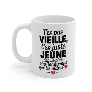 Mug Humour Femme – “T’es pas vieille, t’es juste jeune” – Cadeau Anniversaire Amusant Céramique 325ml