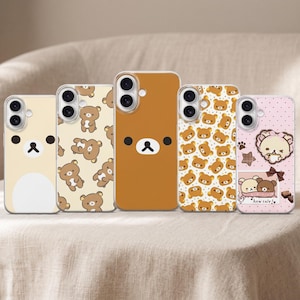 May include: Five mobile phone cases featuring bear-themed designs. The cases display various patterns including a single bear face, repeating bear motifs, and a pink polka dot background with a small rectangular graphic containing the text how cute.