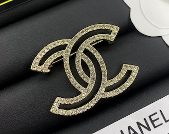 Chanel avocado brooch best sale
