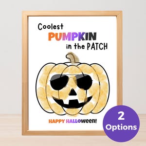 May include: A framed print featuring a watercolor-style yellow pumpkin wearing black sunglasses. The text reads Coolest PUMPKIN in the PATCH and HAPPY HALLOWEEN. The pumpkin has a black triangular nose and a jagged mouth. A purple circle says 2 Options.