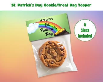 May include: A green and white St. Patrick's Day cookie bag topper with a rainbow, a pot of gold, and the text "Happy St. Patrick's Day".