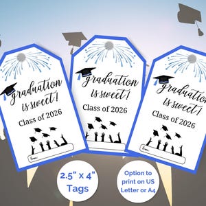 May include: Three graduation gift tags with a blue border and the text "graduation is sweet!" and "Class of 2026". Each tag features a graduation cap and a fireworks design. The tags measure 2.5" x 4".