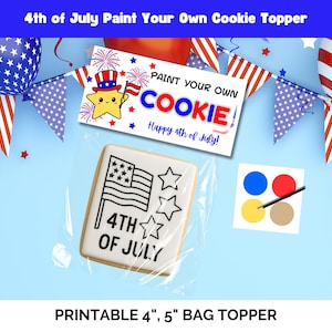 May include: A patriotic 4th of July cookie decorating kit. The kit includes a cookie with an American flag design, paint, and a brush. The image also features a banner that says "Paint Your Own Cookie" and "Happy 4th of July!"