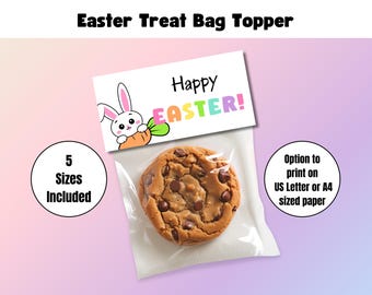 May include: Printable Easter treat bag topper with a cute bunny and carrot design. The topper says "Happy Easter!" in rainbow letters. Five sizes are included. The topper can be printed on US Letter or A4 sized paper.