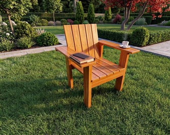 May include: A natural wood Adirondack chair featuring a high slatted back, wide armrests, and a seat. A closed book and a smartphone rest on the left armrest, while a small white ceramic cup sits on the right armrest of the outdoor chair.