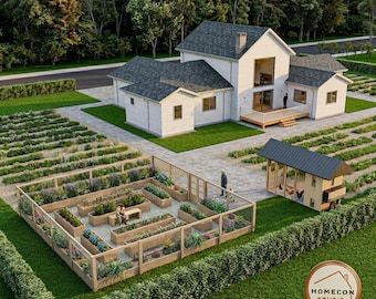 May include: An aerial view of a modern farmhouse with a large garden and a chicken coop. The house is white with a gray roof, and the garden features raised beds filled with plants. A person is sitting on a bench in the garden.