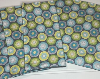 Set of 4 2 ply 8” Cloth Napkins Flower Coins on a Grey Background