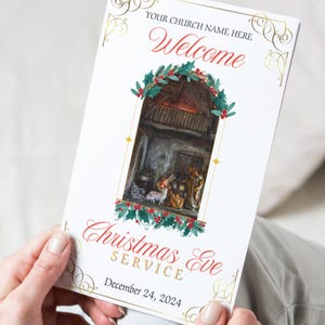 May include: A white Christmas Eve service bulletin with gold and red accents. The bulletin features a picture of a nativity scene with a wooden stable and a manger. The text on the bulletin reads "Welcome" and "Christmas Eve Service" with the date "December 24, 2024".
