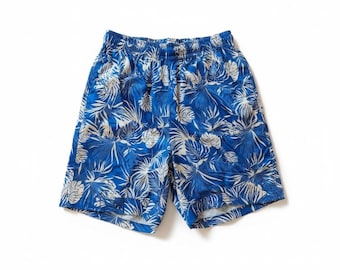 Conjunto de traje tropical azul: blazer y pantalón corto.