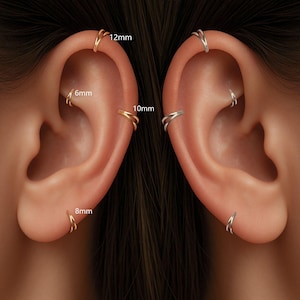 May include: Close-up of two ears, each adorned with multiple hoop earrings. One ear features gold-toned hoops in sizes 6mm, 8mm, 10mm, and 12mm. The other ear showcases silver-toned hoops. The earrings are designed with a double-banded style.