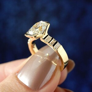 2 carat cushion cut solitaire ring with lab grown diamond in a secure half bezel and artistic flair shank. This engagement ring or anniversary gift offers clean lines and ethical shine—perfect as a forever promise ring or a thoughtful birthday present for her.