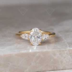 4ct Oval Lab Grown Diamond Engagement Ring: Pear Side Stones, DEF VVS-VS