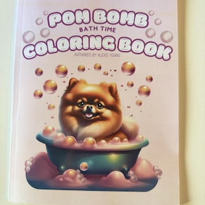 May include: A pink colouring book with the title "Pom Bomb Bath Time Colouring Book" and a cartoon illustration of a fluffy brown dog in a bathtub with bubbles.