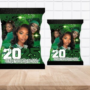 May include: Green and black chip bag with a black border. The bag has a green and black glitter background with a white and green graduation cap. The bag has a white text overlay that says "Class of 2025 Tatum High School".