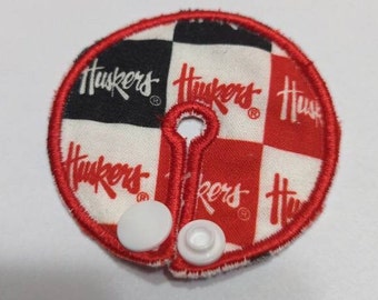 Checkerboard Huskers Print PEG Tube Pad