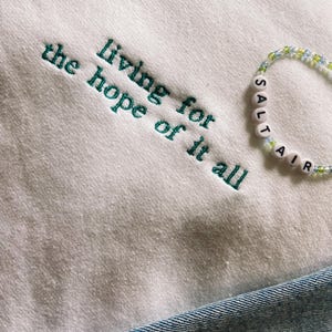 Living for the hope of it all August Crewneck Unisex Sweatshirt