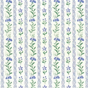 May include: A white background with a repeating pattern of blue and green floral designs. The pattern features a series of vertical stripes with a woven rope design in blue.