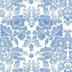 May include: A repeating pattern of blue floral designs on a white background. The pattern features large, detailed flowers, leaves, and smaller floral accents. The design has a slightly distressed, vintage look.