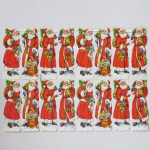 May include: Twelve paper cutouts of Santa Claus in red suits with white trim, holding various Christmas items. Each cutout is on a white background.