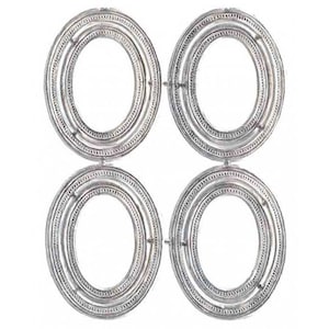 May include: Four silver oval-shaped wall mirrors with concentric circles. Each mirror has a decorative, textured border.