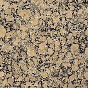 May include: Abstract marbled paper with a black and beige pattern. The pattern resembles a swirling, organic design with a variety of shapes and sizes.