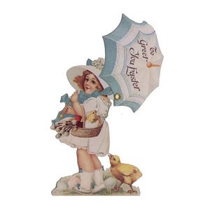 May include: A vintage Easter card featuring a girl in a blue dress and white hat holding a basket of chicks and eggs. She is walking under a blue and white umbrella with the text "To Greet You Easter".
