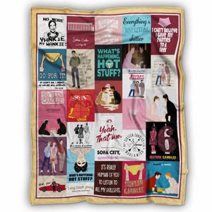 May include: A beige throw blanket featuring a collage of images and text from the movie "Sixteen Candles." The blanket includes various quotes and graphics, with a yellow border. The blanket is rectangular.
