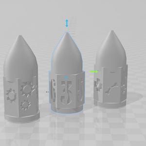 May include: Three gray ceramic candle holders with intricate designs. Each holder has a different pattern, including sun symbols, geometric shapes, and a bone-like design.