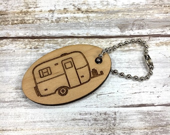 Scamp Camper Oval Key Chain. Personalized wording option available.
