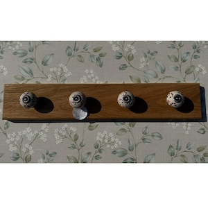 Decorative Coat Hanger Wall Fitted, Solid Oak with 4 Decorative Ceramic Knobs.
