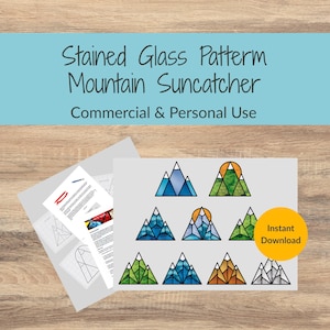 May include: A digital document featuring a stained glass pattern for a mountain suncatcher, displaying nine triangular mountain designs in various colors including blue, green, and orange, with text reading Stained Glass Pattern Mountain Suncatcher.