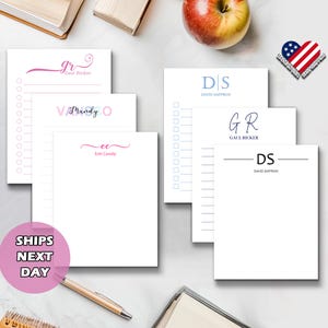 May include: Four different personalized notepad designs with lined paper and a blank space at the top for a name or initials. The designs include a pink notepad with the initials "GR" and the name "Gaul Ricker", a blue notepad with the initials "DS" and the name "David Saffron", a pink notepad with the initials "VS" and the name "Mandy", and a pink notepad with the initials "EC" and the name "Erin Cassity".