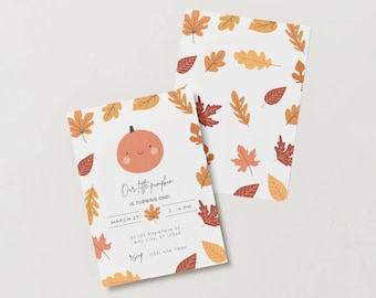 May include: Two white cards with a fall theme. One card features a smiling orange pumpkin and text: "Our little pumpkin is turning one!" with date and time details. The other card has a pattern of autumn leaves in orange, red, and yellow.
