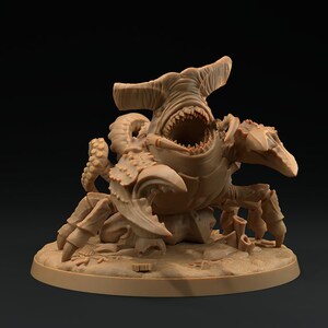 May include: A brown, 3D printed miniature of a monstrous creature with a shark head, crab claws, and octopus tentacles. The creature is posed in a menacing stance with its mouth open, revealing sharp teeth.
