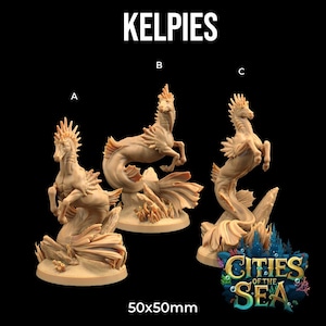 May include: Three beige Kelpies figurines, each with a seahorse-like body and a horse's head, are displayed. The figurines are on a round base and are labeled A, B, and C. The text "KELPIES" is at the top, and "50x50mm" is at the bottom.